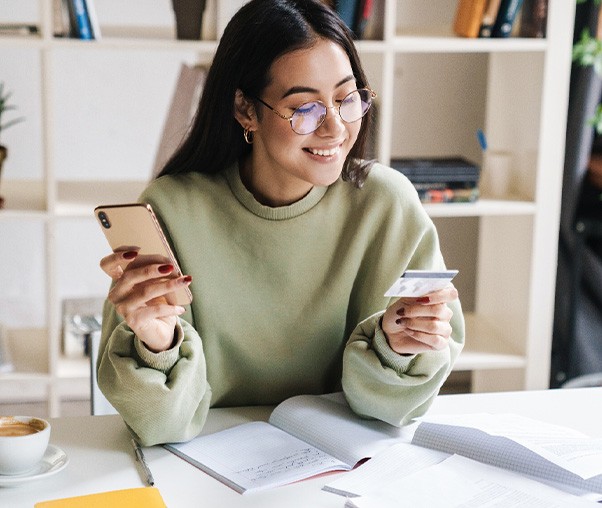 Woman holding a credit card