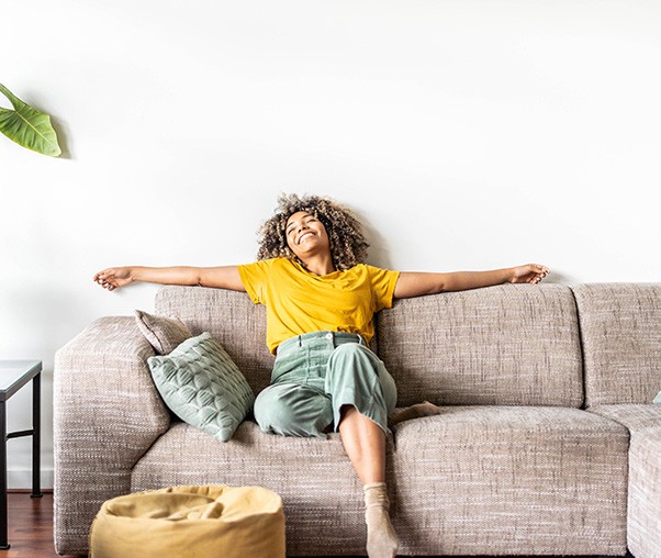a woman relaxing on a couch